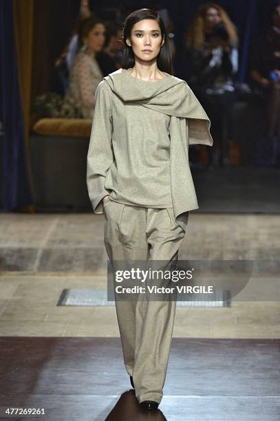 Model walks the runway during the Hermes Ready to Wear Fall/Winter 2014-2015 show as part of the Paris Fashion Week Womenswear Fall/Winter 2014-2015...