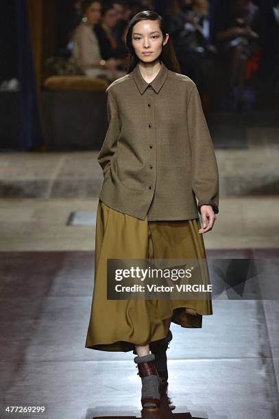 Model walks the runway during the Hermes Ready to Wear Fall/Winter 2014-2015 show as part of the Paris Fashion Week Womenswear Fall/Winter 2014-2015...