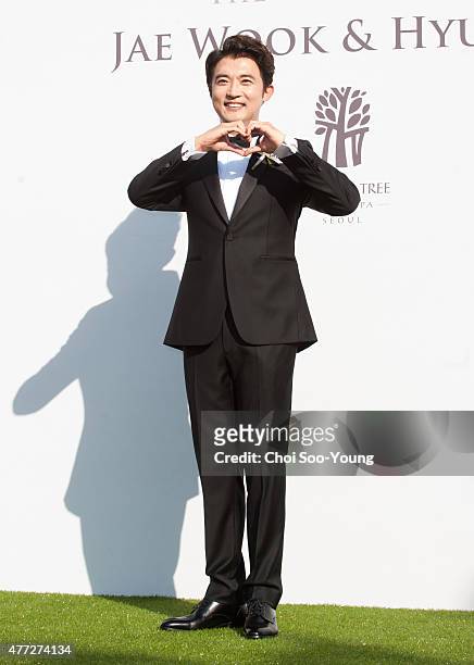 Ahn Jae-Wook poses for photographs before the wedding at Banyan Tree Club & Spa Seoul on June 1, 2015 in Seoul, South Korea.