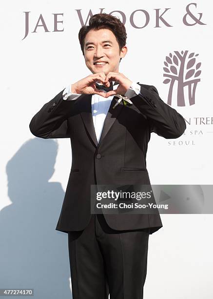 Ahn Jae-Wook poses for photographs before the wedding at Banyan Tree Club & Spa Seoul on June 1, 2015 in Seoul, South Korea.