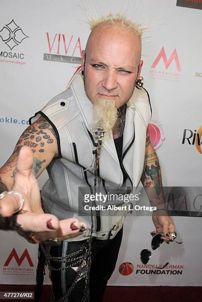 Personality Elvis Strange arrives for the Viva Glam Issue Launch Party Hosted by cover girl Leah Remini held at Riviera 31 on June 2, 2015 in Beverly...