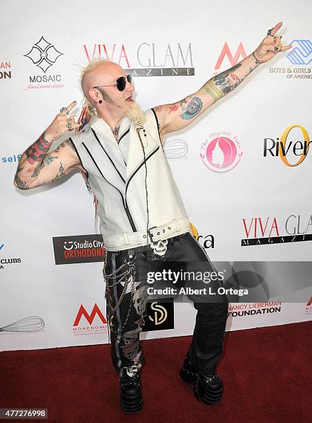 Personality Elvis Strange arrives for the Viva Glam Issue Launch Party Hosted by cover girl Leah Remini held at Riviera 31 on June 2, 2015 in Beverly...