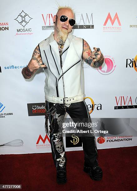 Personality Elvis Strange arrives for the Viva Glam Issue Launch Party Hosted by cover girl Leah Remini held at Riviera 31 on June 2, 2015 in Beverly...