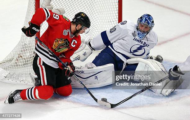 Jonathan Toews of the Chicago Blackhawks tries to score against Ben Bishop of the Tampa Bay Lightning in the second period of Game Six of the 2015...