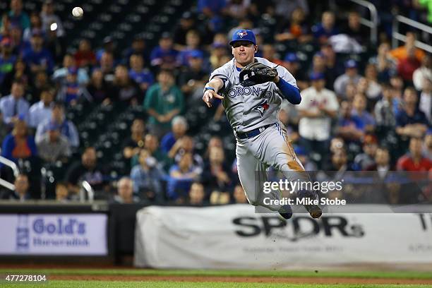 Josh Donaldson of the Toronto Blue Jays throws out Michael Cuddyer of the New York Mets on a groundball in the sixth inning at Citi Field on June 15,...