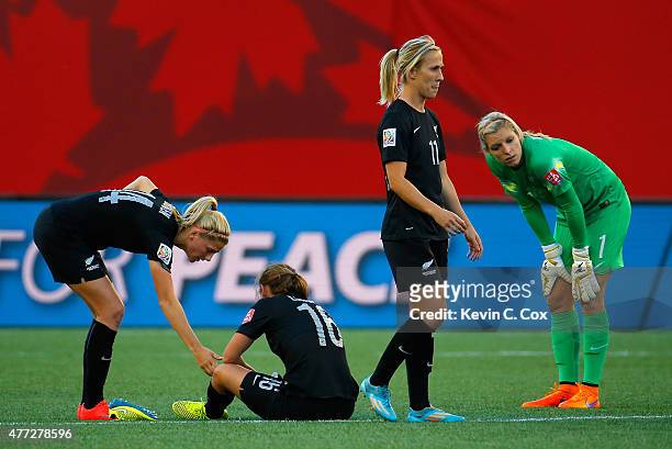 Katie Bowen, Annalie Longo, Kirsty Yallop and goalkeeper Erin Nayler of New Zealand react after their 2-2 tie with China PR in the FIFA Women's World...