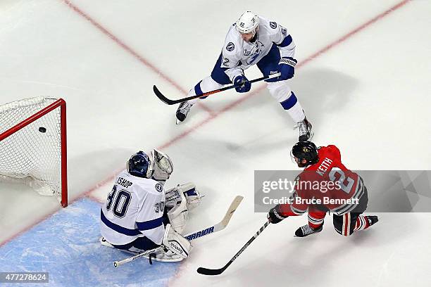 Duncan Keith of the Chicago Blackhawks scores a goal in the second period against Ben Bishop of the Tampa Bay Lightning during Game Six of the 2015...