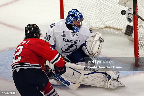 Duncan Keith of the Chicago Blackhawks scores a goal in the second period against Ben Bishop of the Tampa Bay Lightning during Game Six of the 2015...