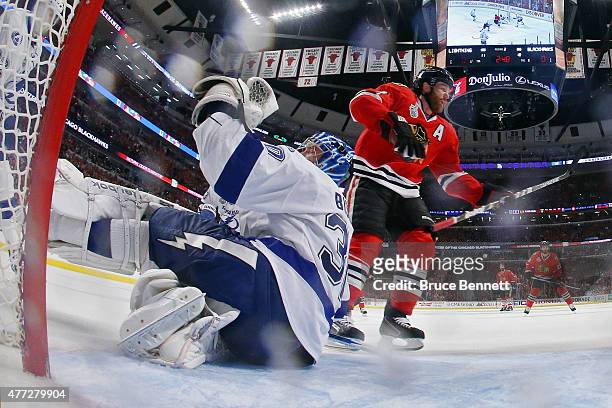 Duncan Keith of the Chicago Blackhawks scores a goal in the second period against Ben Bishop of the Tampa Bay Lightning during Game Six of the 2015...