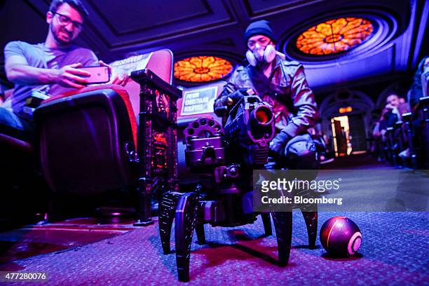 Machine gun robot from Tom Clancy's The Division is controlled by a character actor during a UbiSoft Entertainment SA event ahead of the E3...