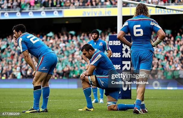 Italian players look dejected after defeat during the RBS Six Nations match between Ireland and Italy at Aviva Stadium on March 8, 2014 in Dublin,...