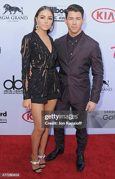 Olivia Culpo and Nick Jonas arrive at the 2015 Billboard Music Awards at MGM Garden Arena on May 17, 2015 in Las Vegas, Nevada.