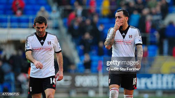 Giorgos Karagounis and Konstantinos Mitroglou of Fulham react after the Barclays Premier league match between Cardiff City and Fulham at Cardiff City...