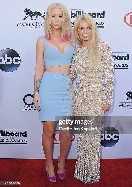 Singer Iggy Azalea and singer Britney Spears arrive at the 2015 Billboard Music Awards at MGM Garden Arena on May 17, 2015 in Las Vegas, Nevada.