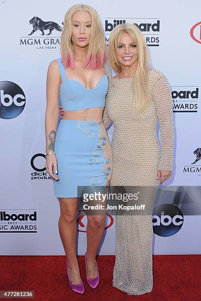 Singer Iggy Azalea and singer Britney Spears arrive at the 2015 Billboard Music Awards at MGM Garden Arena on May 17, 2015 in Las Vegas, Nevada.