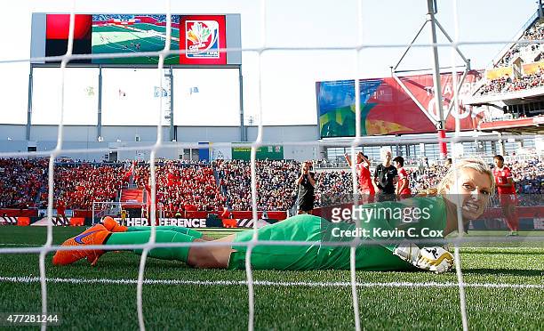 Goalkeeper Erin Nayler of New Zealand looks in the goal after failing to stop a penalty kick goal by Wang Lisi of China PR during the FIFA Women's...