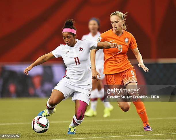 Desiree Scott of Canada is challenged by Vivianne Miedemas of The Netherlands during the FIFA Women's World Cup Group A match between Netherlands and...