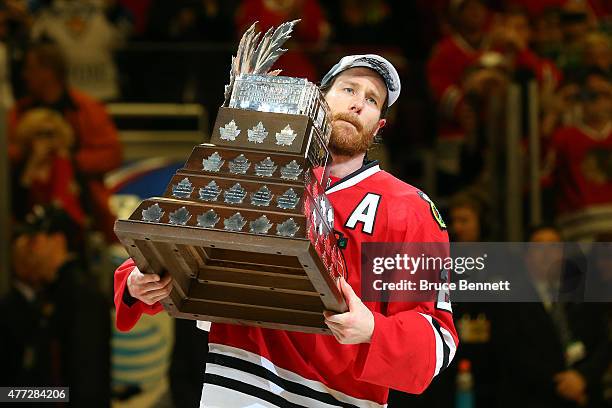 Duncan Keith of the Chicago Blackhawks celebrates with the Conn Smythe trophy after defeating the Tampa Bay Lightning by a score of 2-0 in Game Six...