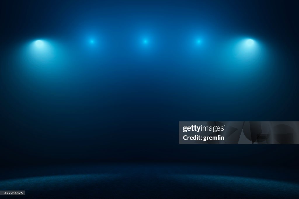 Vazio com holofotes de palco
