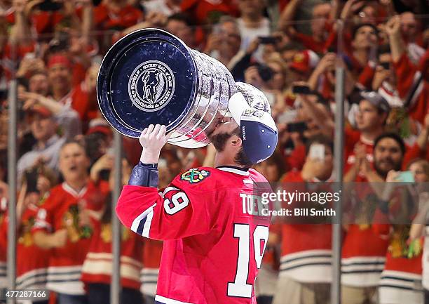 Jonathan Toews of the Chicago Blackhawks celebrates with the Stanley Cup after defeating the Tampa Bay Lightning 2-0 in Game Six to win the 2015 NHL...