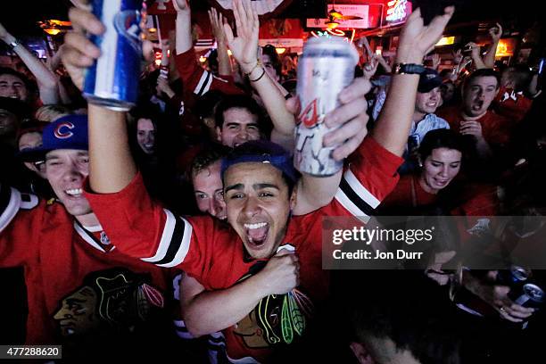 Chicago Blackhawk fans celebrate a goal during Game Six of the NHL 2015 Stanley Cup Final at Sluggers World Class Sports Bar on June 15, 2015 in...