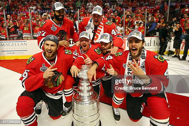 Swedish players Johnny Oduya, Viktor Svedberg, Marcus Kruger, Joakim Nordstrom, David Rundblad and Niklas Hjalmarsson of the Chicago Blackhawks pose...