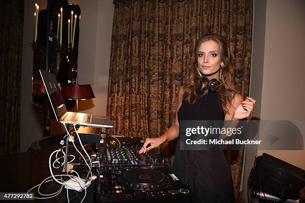 Alex Merrell, wearing Max Mara, spins at The Max Mara 2015 Women In Film Face Of The Future event at Chateau Marmont on June 15, 2015 in West...