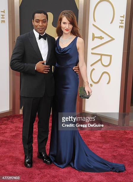 Actor Chiwetel Ejiofor and Sari Mercer arrive at the 86th Annual Academy Awards at Hollywood & Highland Center on March 2, 2014 in Hollywood,...