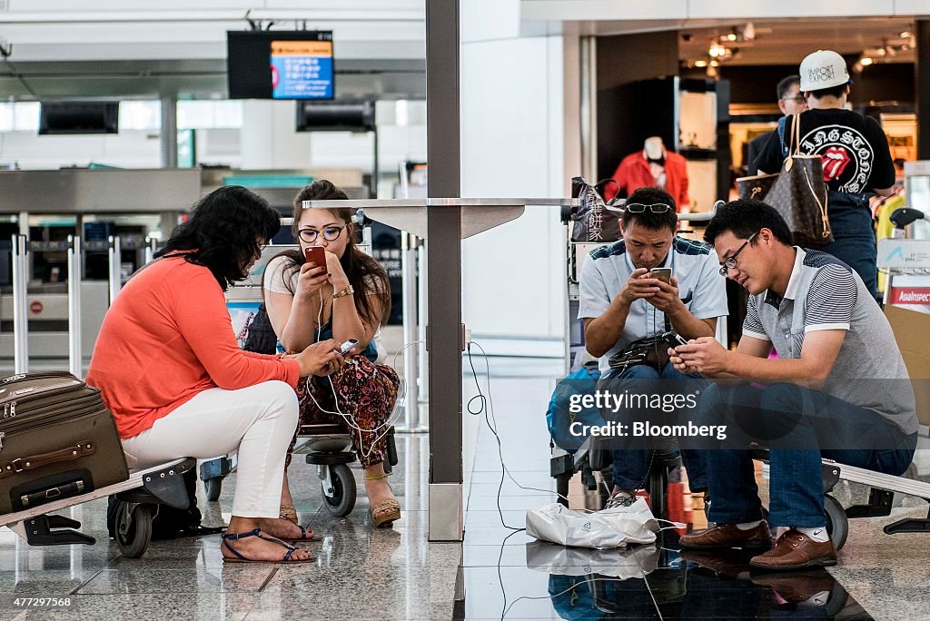 Travelers At Hong Kong International Airport