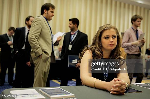 Kaitlin Foran, a senior at the College of Charleston in South Carolina, speaks with a prospective employer at a job fair during the 41st annual...