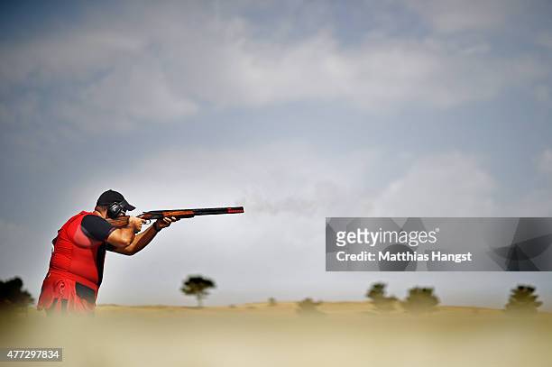 Oguzhan Tuzun of Turkey shoots in the Men's Trap Shooting qualification during day four of the Baku 2015 European Games at Baku Shooting Centre on...