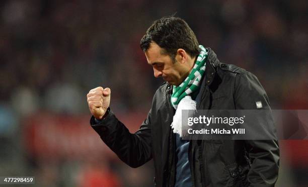 Head coach Robin Dutt of Bremen clenches his fist after his teams victory during the Bundesliga match between 1. FC Nuernberg and Werder Bremen at...