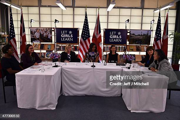 First Lady Michelle Obama sits between Fiona Mavhinga of CAMA, Dr. Pauline Rose of Cambridge University, The UK Department of International...