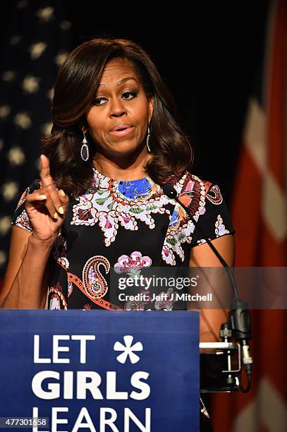 First Lady Michelle Obama points her finger as she speaks to students as part of the 'Let Girls Learn Initiative' at the Mulberry School for Girls on...