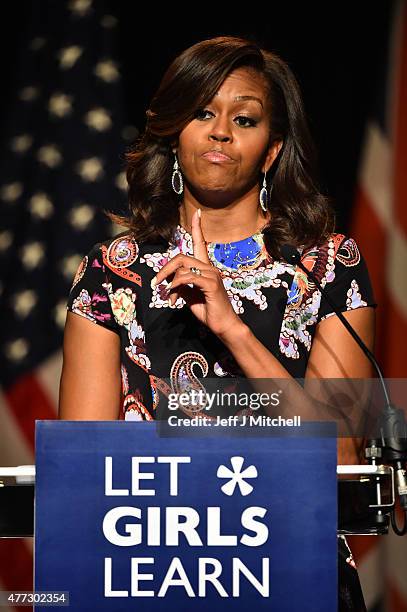 First Lady Michelle Obama points her finger as she speaks to students as part of the 'Let Girls Learn Initiative' at the Mulberry School for Girls on...