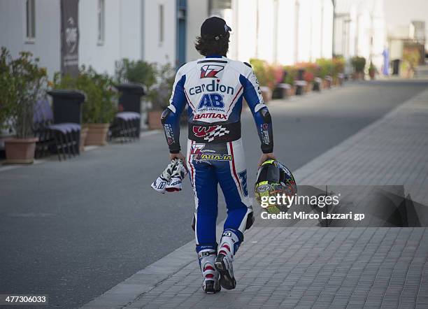 Karel Abraham of Czech and Cardion AB Motoracing walks in paddock during the MotoGP Tests in Losail - Day Two at Losail Circuit on March 8, 2014 in...