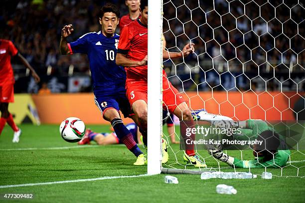 Mohamad Izwan Bin Mahbud of Singapore saves the ball on the line during the 2018 FIFA World Cup Asian Qualifier second round match between Japan and...