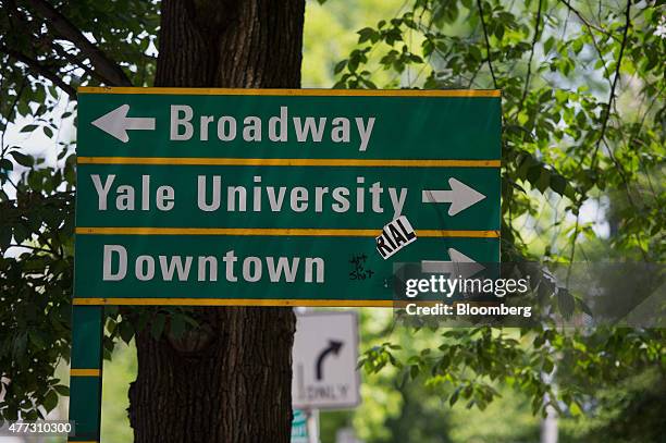 Street sign stands on the Yale University campus in New Haven, Connecticut, U.S., on Friday, June 12, 2015. Yale University is an educational...