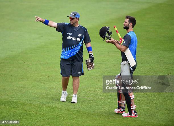 Craig McMillan of New Zealand speaks with Grant Elliott during net practice at Trent Bridge on June 16, 2015 in Nottingham, England.