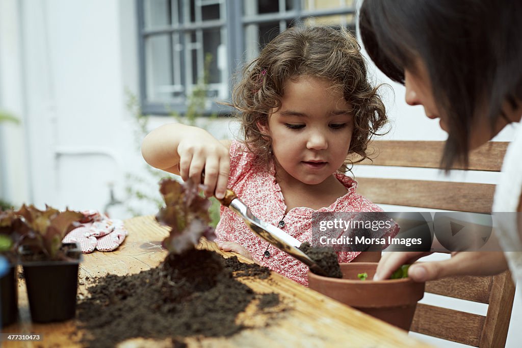 Mother and daughter gardening