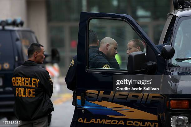 Police remain at the scene of a balcony collapse at an apartment building near UC Berkeley on June 16, 2015 in Berkeley, California. 5 people were...