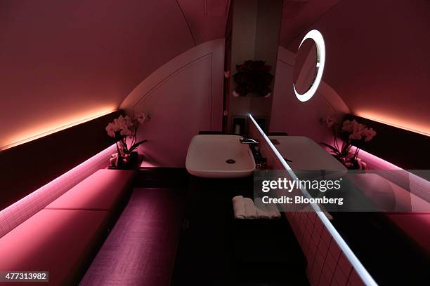 Subdued lighting illuminates a First Class bathroom cabin inside an Airbus SAS A380 aircraft, operated by Qatar Airways Ltd., on day two of the 51st...