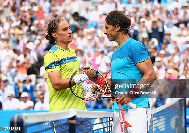 Alexandr Dolgopolov of Ukraine shakes hands with Rafael Nadal of Spain after their men's singles first round match against during day two of the...