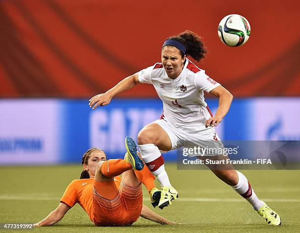 Carmelina Moscato of Canada is challenged by Danielle Van De Donk of The Netherlands during the FIFA Women's World Cup Group A match between...