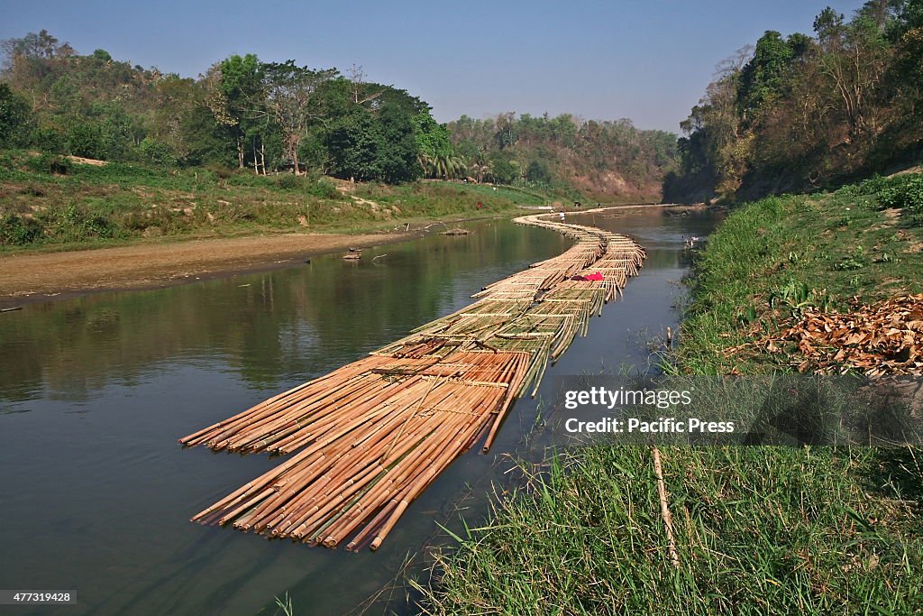 A group of local people are bamboo rafting on the Matamuhuri...