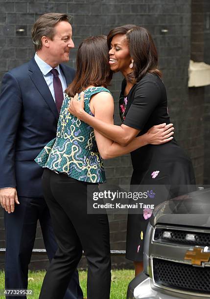 The US First Lady Michelle Obama is greeted by David Cameron and Samantha Cameron during her visit of 10 Downing Street on June 16, 2015 in London,...