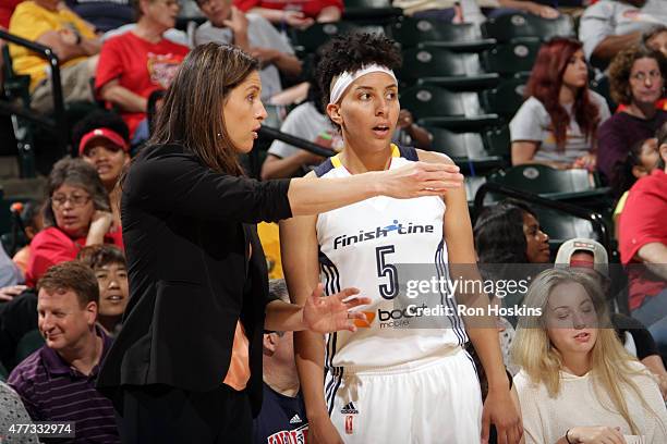 Lin Dunn and Layshia Clarendon of the Indiana Fever speak during a game against the Chicago Sky on June 14, 2015 at Bankers Life Fieldhouse in...