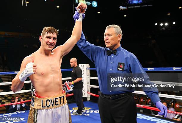 Referee Jay Nady raises the arm of Steve Lovett after his 2nd round knockout win over Francisco Molina at the MGM Grand Garden Arena on March 8, 2014...