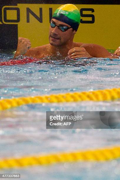 Brazilian swimmer Leonardo De Deus celebrates after the final of the men's 200m Freestyle category during the X South American Games in Santiago, on...