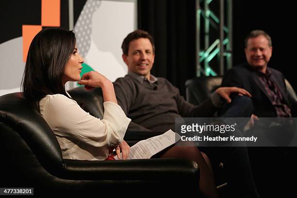 Actress Olivia Munn, TV host Seth Meyers and producer Michael Shoemaker speak onstage at "Inside Late Night with Seth Meyers" during the 2014 SXSW...